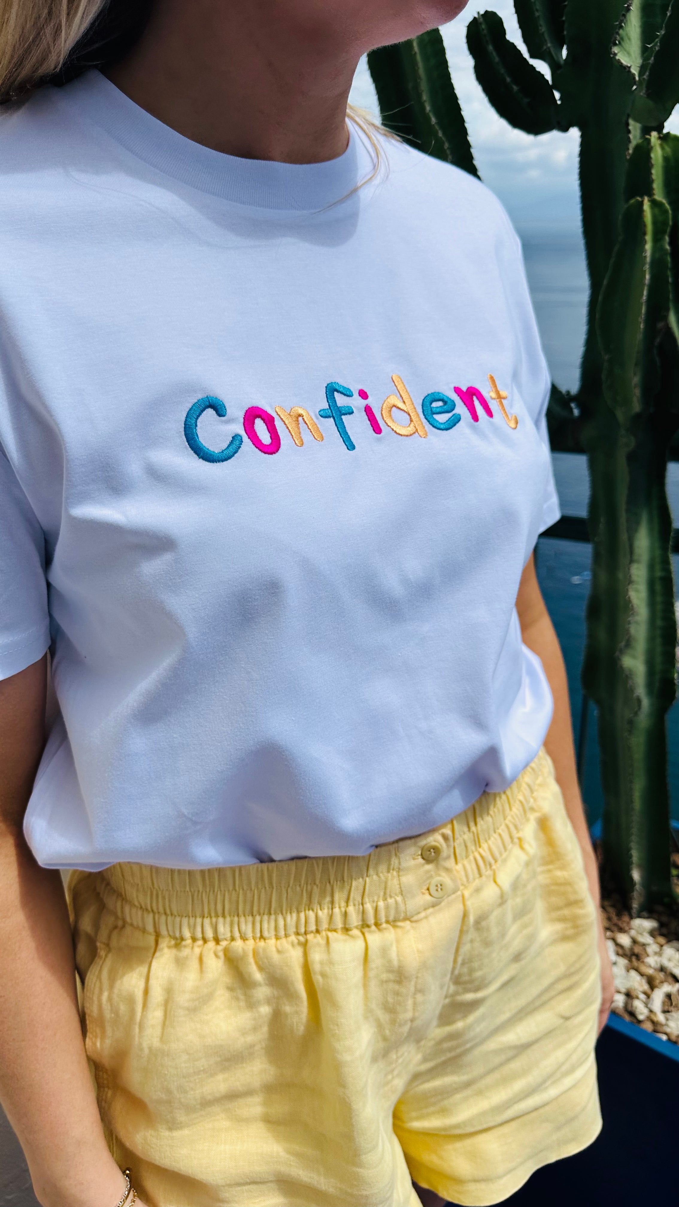 Confident White Embroidered Unisex T-Shirt
